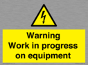 warning-work-in-progress-on-equipmentwith-electrical-hazard-symbol~